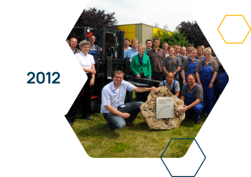 Group photo during the gift presentation for the 50th anniversary of Dorweiler.