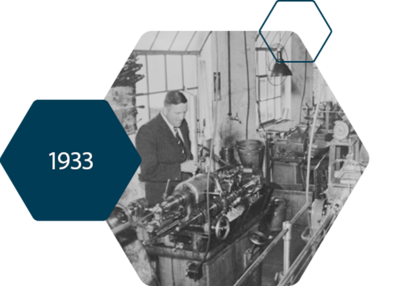 Black and white picture of Wilhelm Heinrichs in the workshop